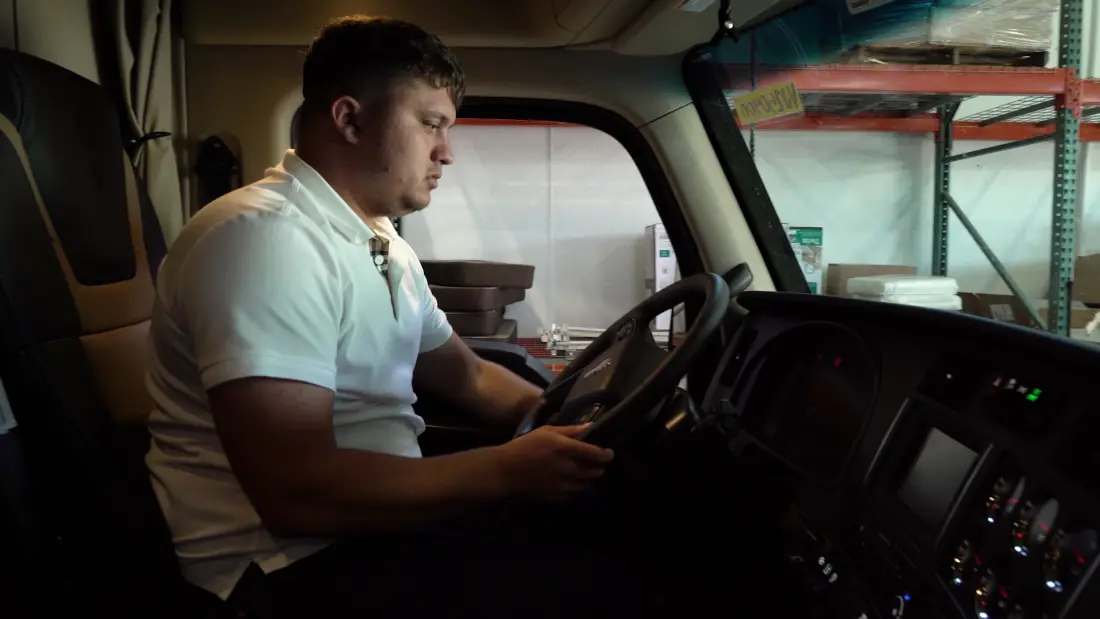 Driver in the cab of a Pro Star truck